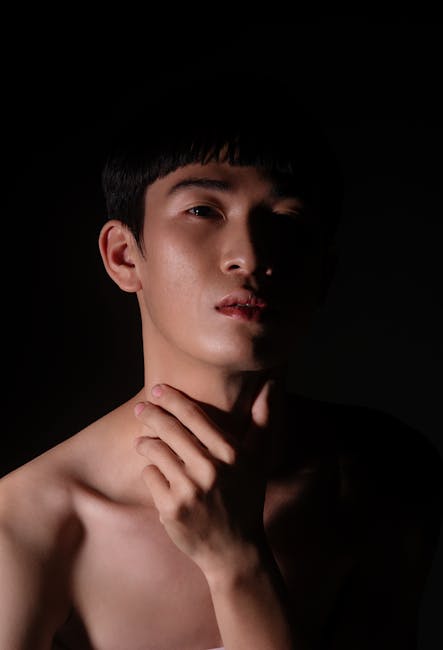 Contemplative male portrait with natural window light