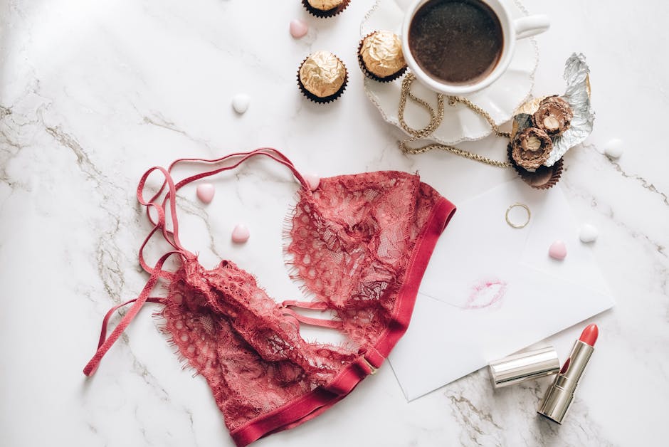 Lingerie flatlay with coffee and accessories for boudoir session planning